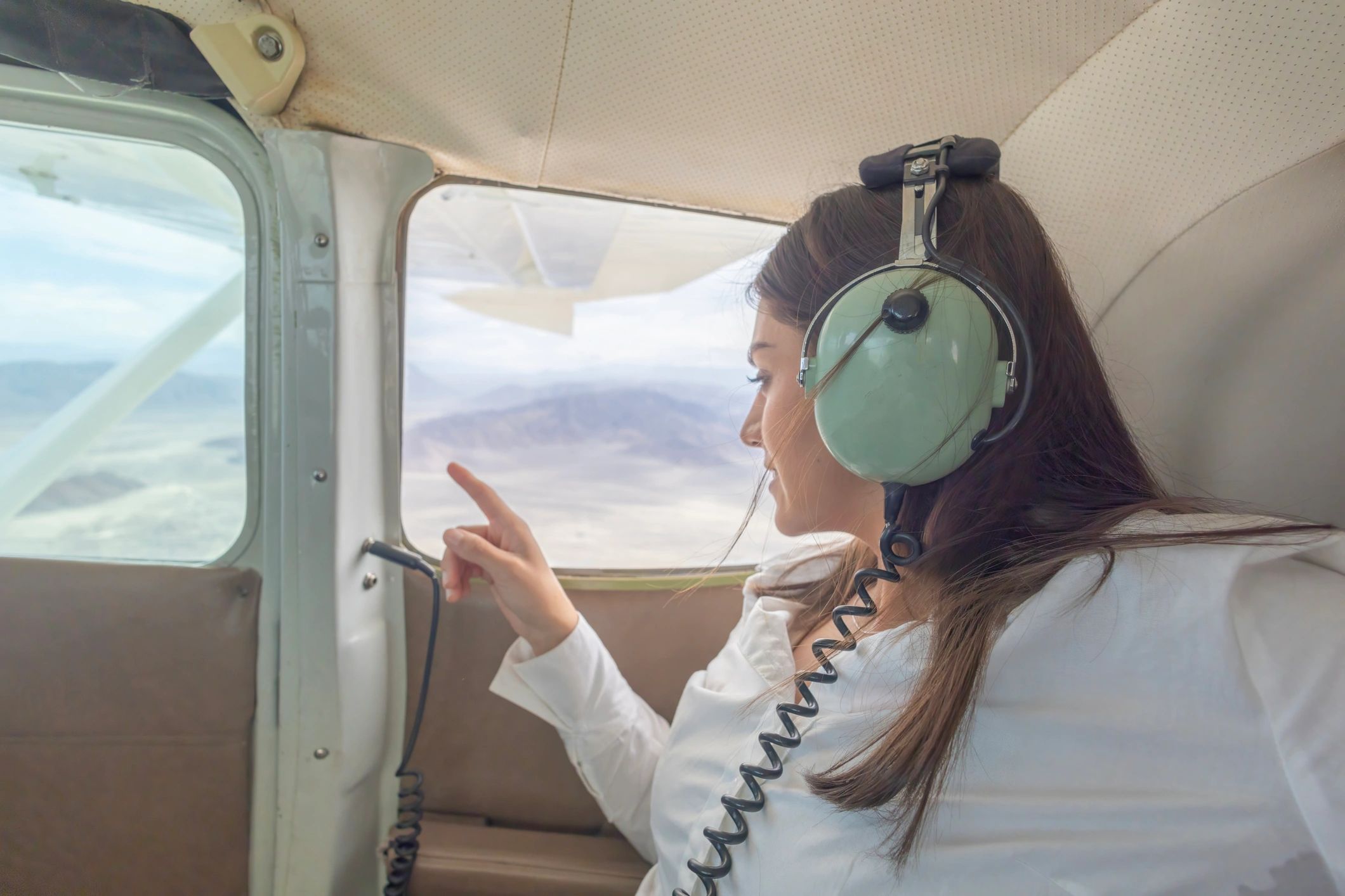 Glenn B Allyn piloting a jet aircraft